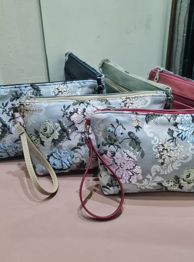 BOLSO DE MANO Y COLGAR DE TELA FALLERA Y PIEL.