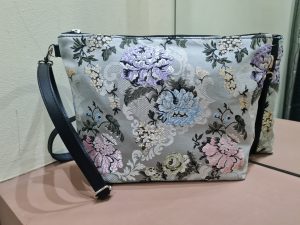 BOLSO BANDOLERA DE TELA FALLERA Y PIEL.