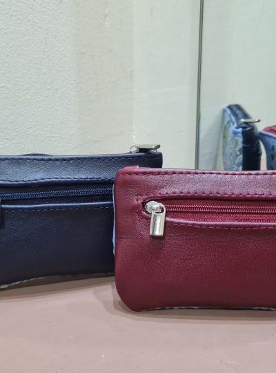 MONEDEROS DE TELA FALLERA Y PIEL.