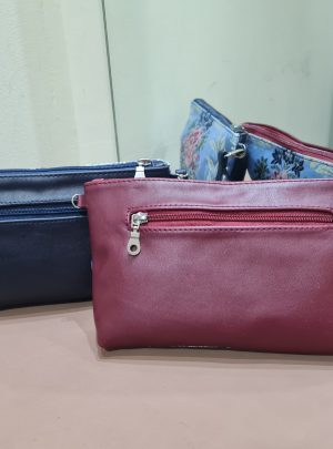 BOLSO DE MANO Y COLGAR DE TELA FALLERA Y PIEL.