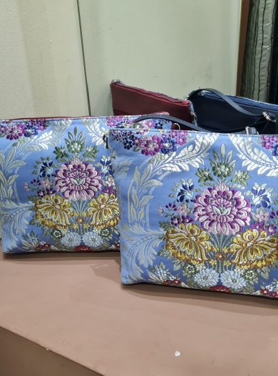 BOLSO BANDOLERA DE TELA FALLERA Y PIEL.
