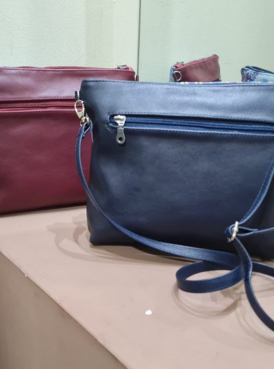 BOLSO BANDOLERA DE TELA FALLERA Y PIEL.